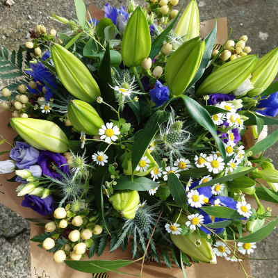 Forever Yours - Show your affection with this fabulous hand-tied  featuring white oriental lilies and foliage.