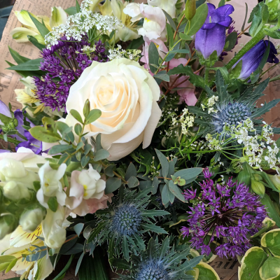 Cool Breeze - This classical stylish collection of flowers, make this hand tied the perfect gift. Flowers professionally arranged and delivered by a local florist.