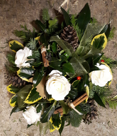 Memorial Posy - Holly and spruce with artificial roses and cones, suitable for a grave.  If you would like us to place it on a grave please provide the What3words reference.   Available from 23rd November.