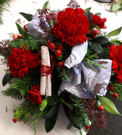 Memorial Posy - Holly and spruce with artificial roses and cones, suitable for a grave.  If you would like us to place it on a grave please provide the What3words reference.   Available from 23rd November.