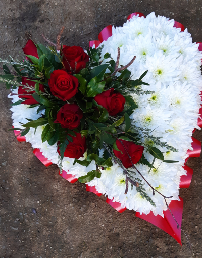 Heart - A heart shaped funeral tribute, massed in white chrysanthemum and with a beautiful spray of flowers in your choice of colours (please state choice in comments box)